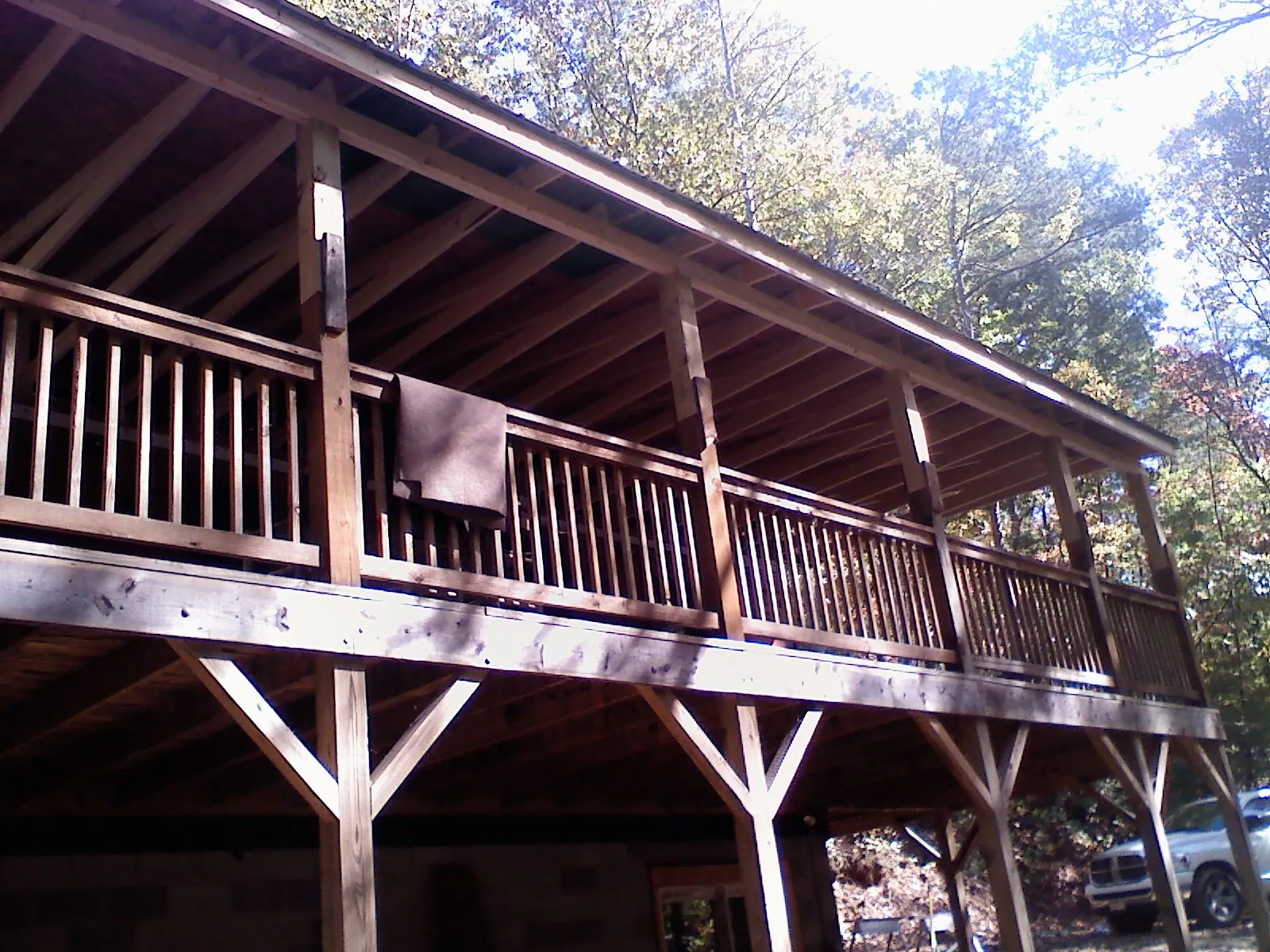Timber framing under a new elevated porch and deck — Roof Leak Repair in Lenox by Roofing Brothers
